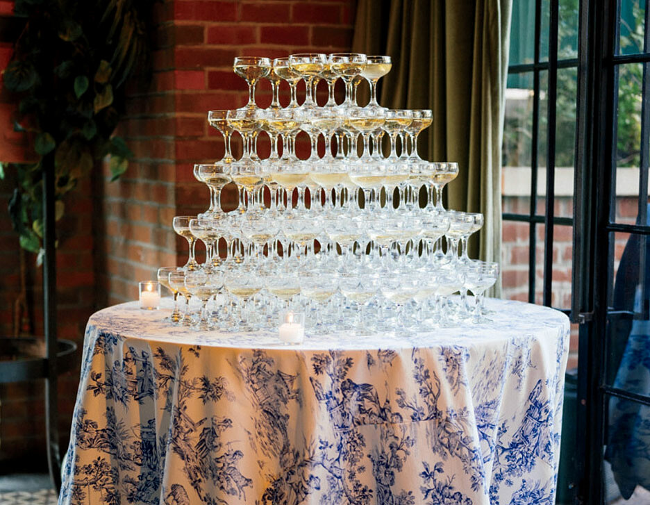 A champagne tower at a wedding planned by Jove Meyer