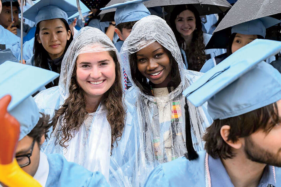 Graduates in ponchos at Columbia's 2025 commencement 