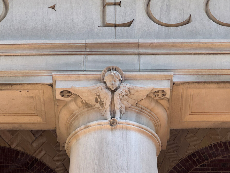 A cherub at the top of a column at St. Paul's Chapel
