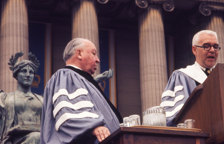Alfred Hitchcock receiving an honorary doctoral degree at Columbia University