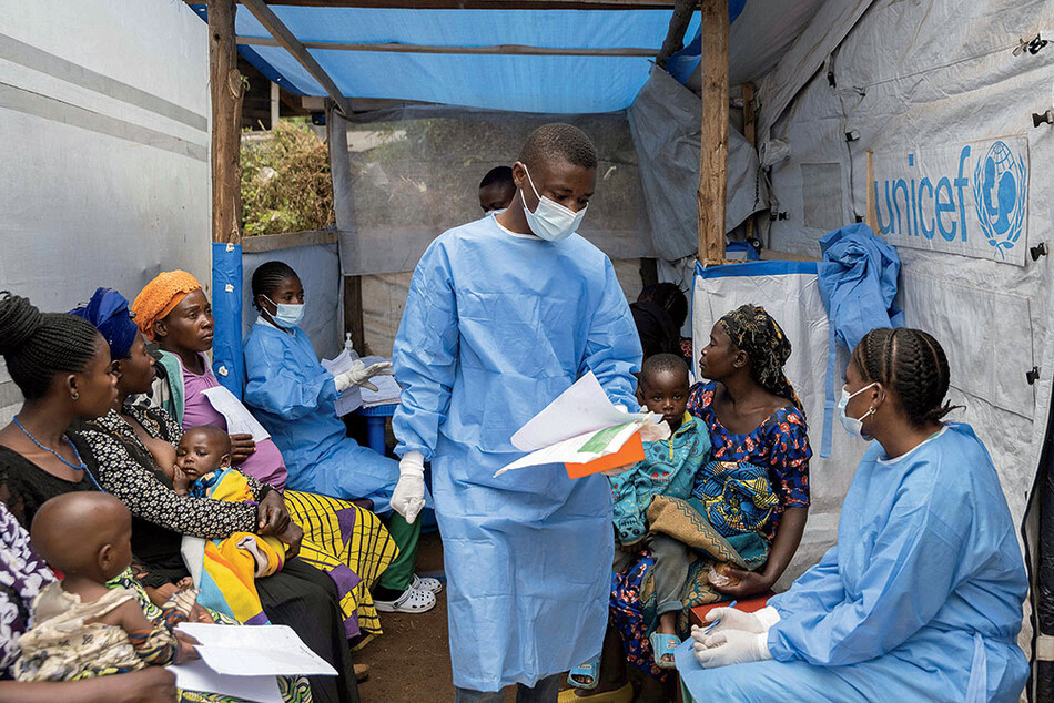Health workers examine suspected mpox patients in the Democratic Republic of the Congo, 2024