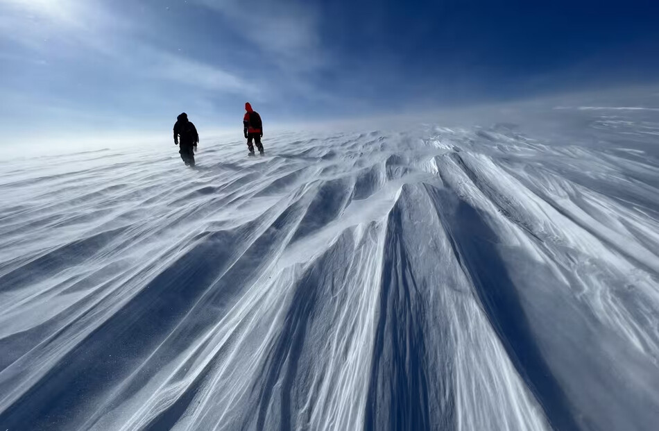 GreenDrill team members at Prudhoe Dome, a key ice cap part of the Greenland Ice Sheet. 