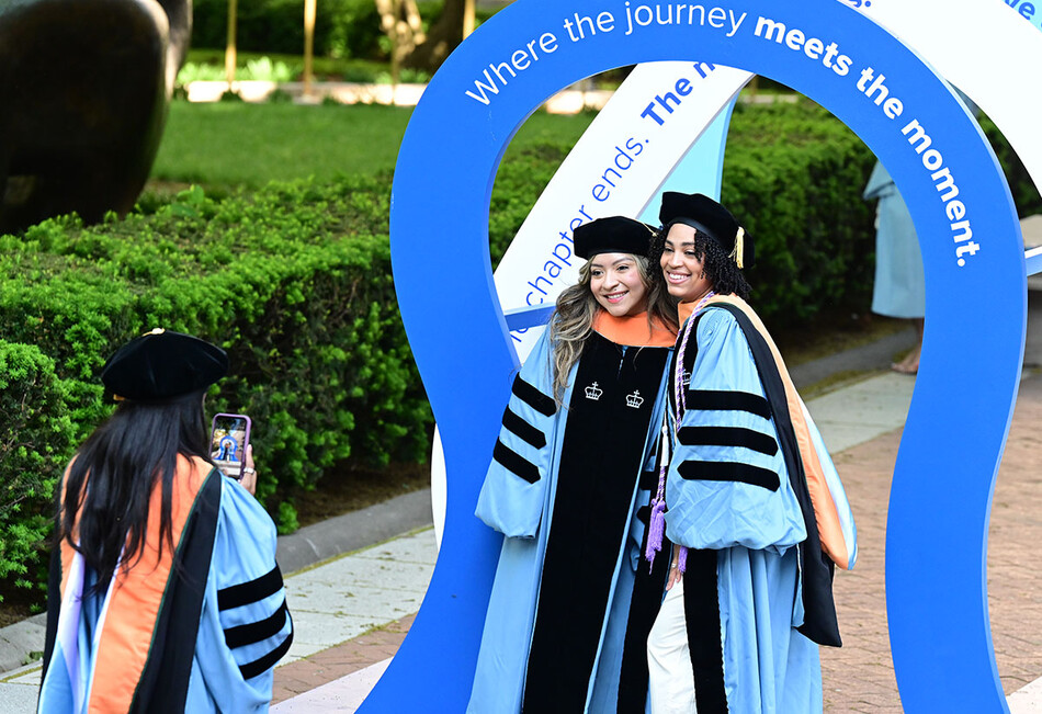 Columbia graduates posing for a photo at 2026 commencement