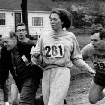 Kathrine Switzer being chased down on race track